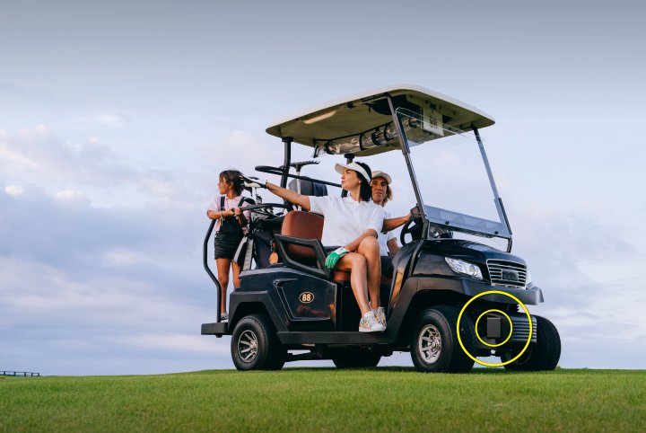 Golf cart with GPS tracker installed